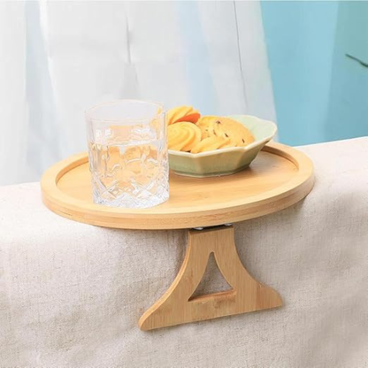 Striveira bamboo sofa arm tray with glass and snacks clipped onto couch